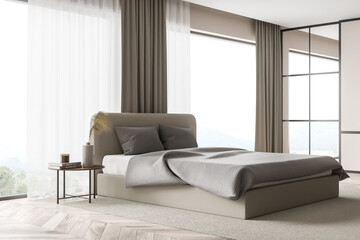 Corner of beige bedroom with panoramic windows