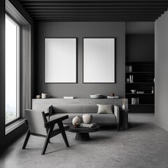 Two canvases on wall of dark grey living room with concrete flooring