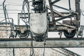 Fototapeta na wymiar Electric hoist, telpher, bridge girder crane.