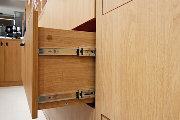 Pull-out drawer in a clothing store. Сloset drawer