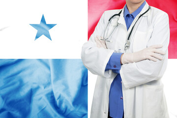 Doctor standing with the flag