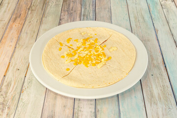 Mexican quesadilla synchronized with ham and melted cheese