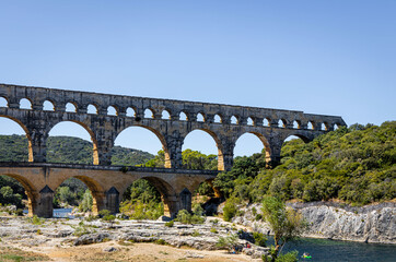 The aerial view of the Pont du Gard, an ancient tri-level Roman aqueduct bridge in France