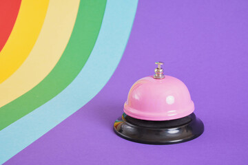 pink service bell on colorful background copy space