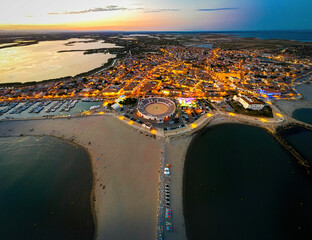 The aerial view of Saintes-Maries-de-la-Mer,  the capital of the Camargue in the south of France - obrazy, fototapety, plakaty