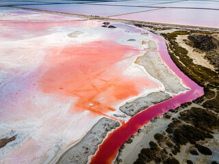 The aerial view of salt production in Camargue, Salin-de-Giraud, France - obrazy, fototapety, plakaty