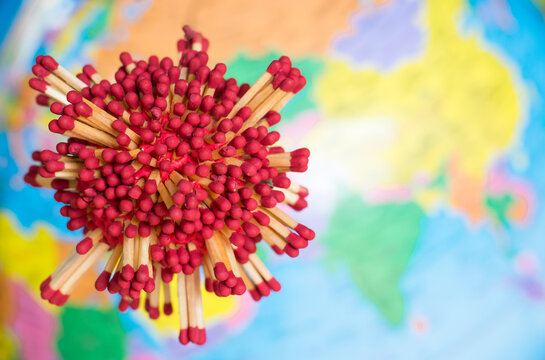 Covid-19 cells model make it from matchstick with world map background