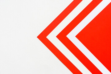 abstract background concept with stacking of color paper in geometric pattern, layers of blank red paper and white  on white paper background.