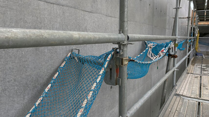 Small safety net to be installed under the scaffolding to prevent objects from falling at height.