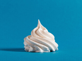 Delicious, sweet dessert white, apple marshmallow. Handmade. Isolated on a light blue background. Close-up.