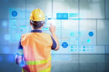 Asian engineer or technician with graphic display