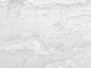 Rough white stone wall background in vintage style for graphic design or wallpaper