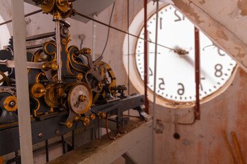 handcrafted antique bell tower clock mechanism from the 19th century that moves 4 clocks, one for each face