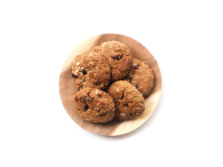 Top view oatmeal cranberry cookies on white bakcground