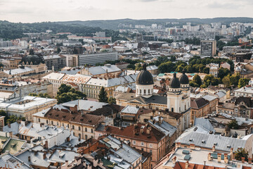 Fototapeta na wymiar View of Church of the Transfiguration and Opera house in Lviv city center.