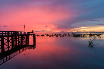 Fototapeta na wymiar Mobile Bay pier at sunset 