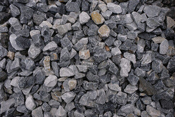 Decorative gray marble stone. Natural small stones for design.
