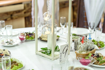 Beautiful floral compositions in the restaurant for the wedding ceremony