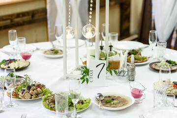 Beautiful floral compositions in the restaurant for the wedding ceremony
