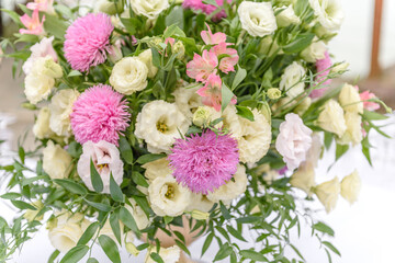 Beautiful floral compositions in the restaurant for the wedding ceremony