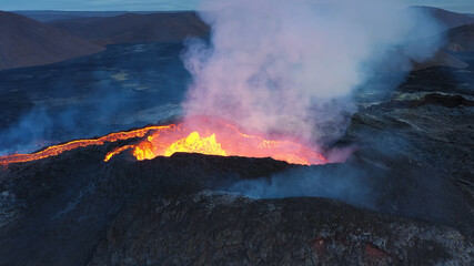 Lava flows from Mount Fagradalsfjall, aerial evening view, iceland
lava spill out of the crater  Mount Fagradalsfjall, September 2021, Iceland 
