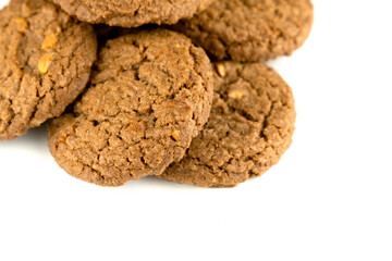 Delicious tasty snack of brown cookies with peanut isolated on white background