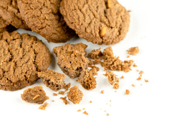 Delicious tasty snack of brown cookies with peanut isolated on white background