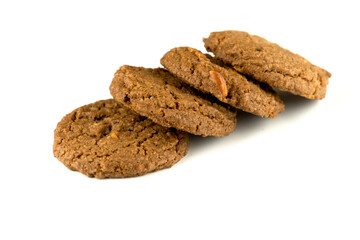 Delicious tasty snack of brown cookies with peanut isolated on white background