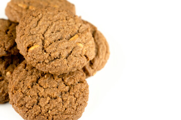 Delicious tasty snack of brown cookies with peanut isolated on white background
