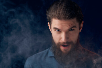 portrait of a man smoke nicotine fashion Lifestyle isolated background