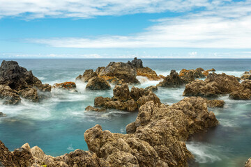 Porto Moniz natural pools, with horizon, soft ocean water and color