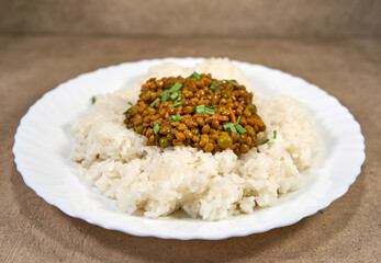 Rice with lentils on the plate