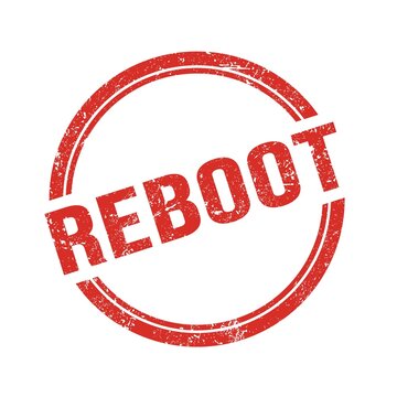 REBOOT text written on red grungy round stamp.
