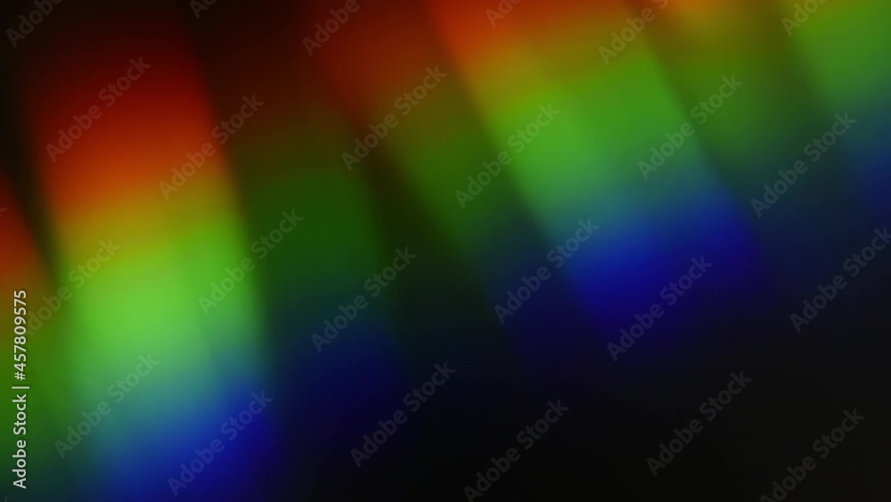 Canvas Prints colorful rgb light lines move randomly on a black background. iridescent refractions light leaks for