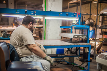 Fototapeta na wymiar Professional worker technician machinist work in factory production workplace