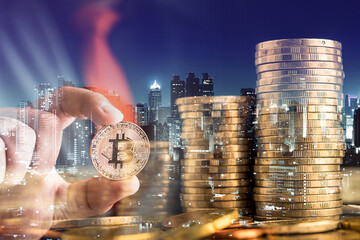 double exposure of Businessman investor hold bitcoin in hand with step of golden coins with blur city night background, bit coin BTC the new virtual electronic money, investment concept	
