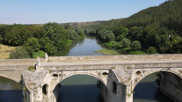 Aerial view of Nineteenth-century bridge over the Yantra River, known as the Kolyu Ficheto Bridge in Byala, Ruse region, Bulgaria