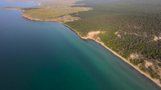 The picturesque shore of the Sarai beach. A trip to Lake Baikal.