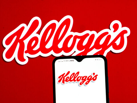 In this photo illustration Kellogg Company logo seen displayed on a smartphone