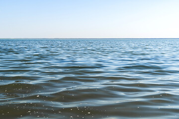 flat surface of salt lake water