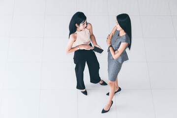 Business team shaking hands during meeting at office. Top view.