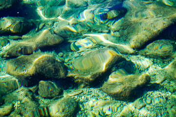 Rib on clear sea water, rocky seabed, Adriatic sea 