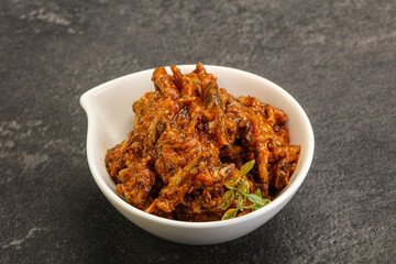 Canned anchovy in tomato sauce