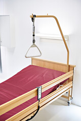 Medical bed with handle
