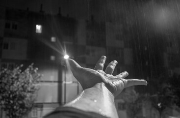 hand in the rain