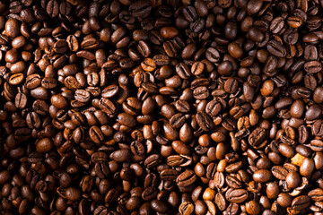 Roasted Coffee Beans Background Texture in Warm Light