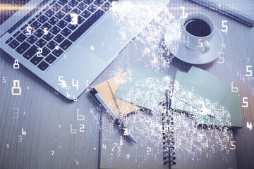 Technology hologram drawing over computer on the desktop background. Top view. Double exposure. Tech concept.