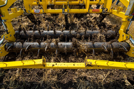 cultivator at work, close up of fragment of deep ripper
