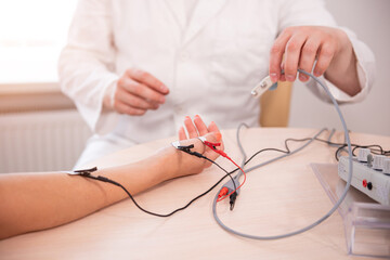 Patient nerves testing using electromyography at medical center
