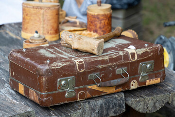 old suitcase full of wooden tools